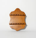 Wooden spoon rack on a white background
