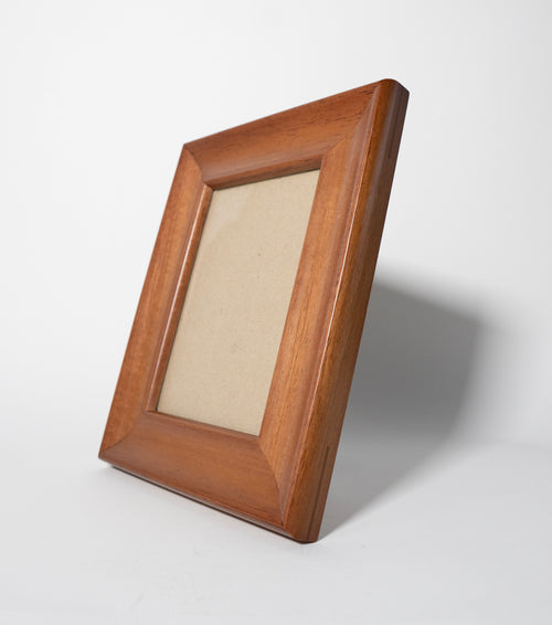 Wooden picture frame on a white background