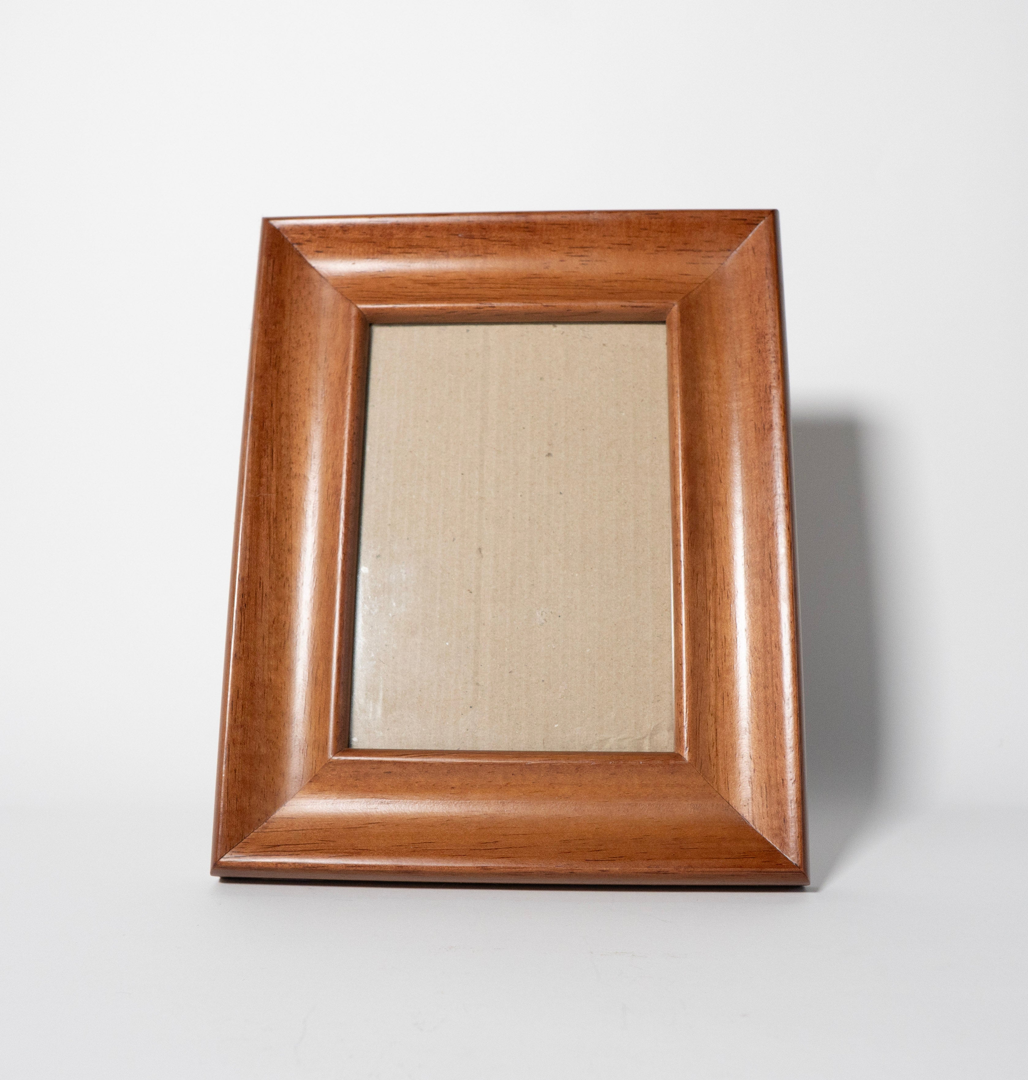 Wooden picture frame on a white background