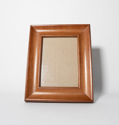 Wooden picture frame on a white background