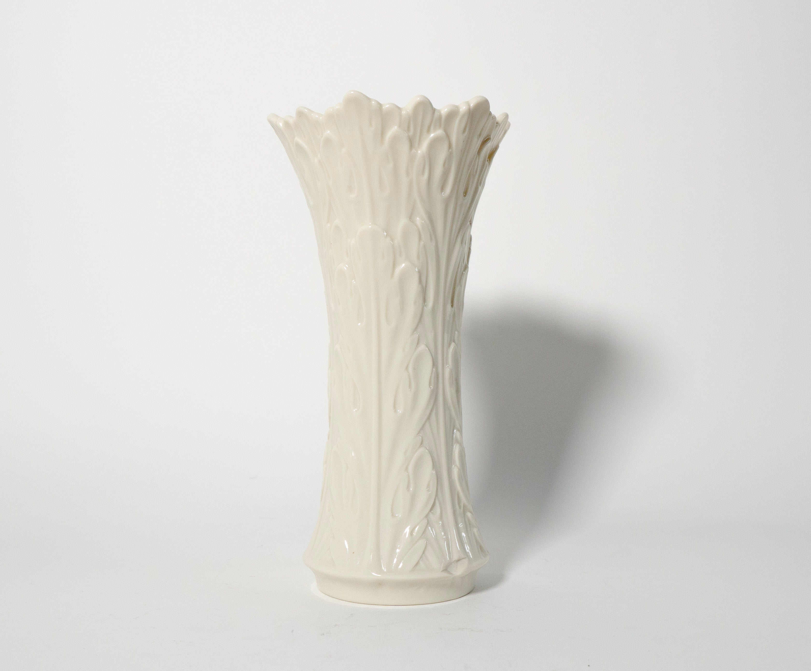 White textured vase on a light gray background