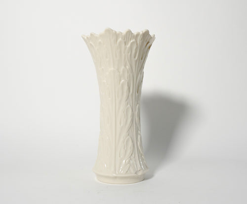 White textured vase on a light gray background