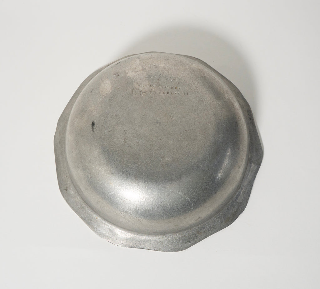 Bottom of serving bowl on a white background