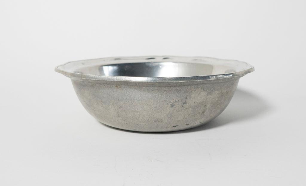 Metallic bowl on a white background