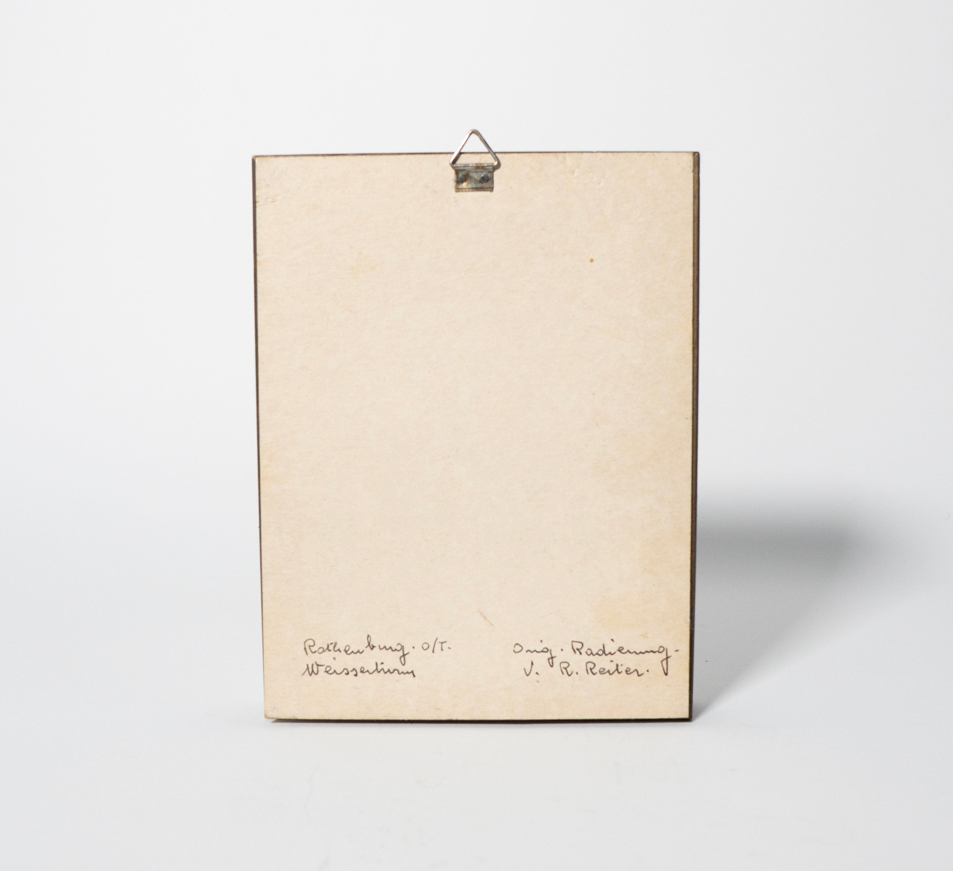 Rectangular wooden plaque with engraved text on a white background