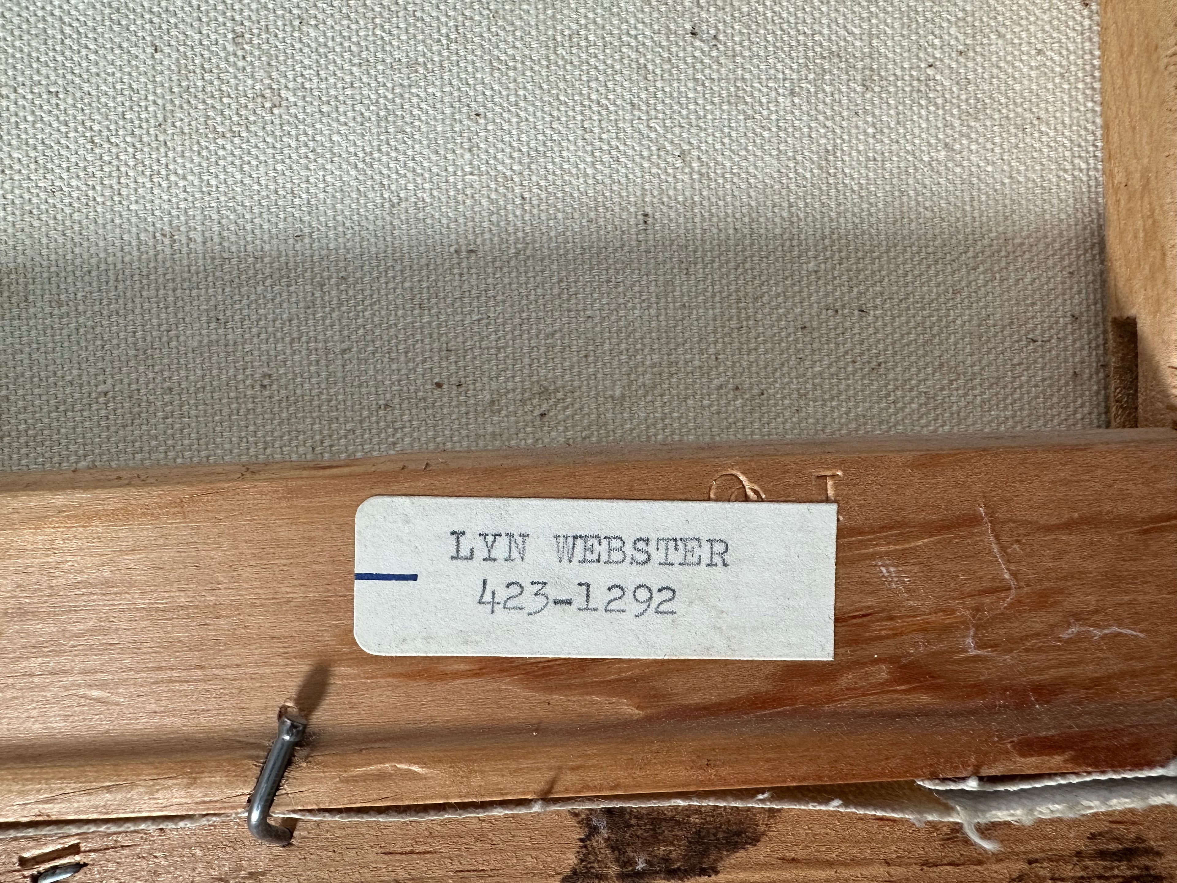 Canvas with a label reading 'LYN WEBSTER 423-1292' attached to a wooden frame.