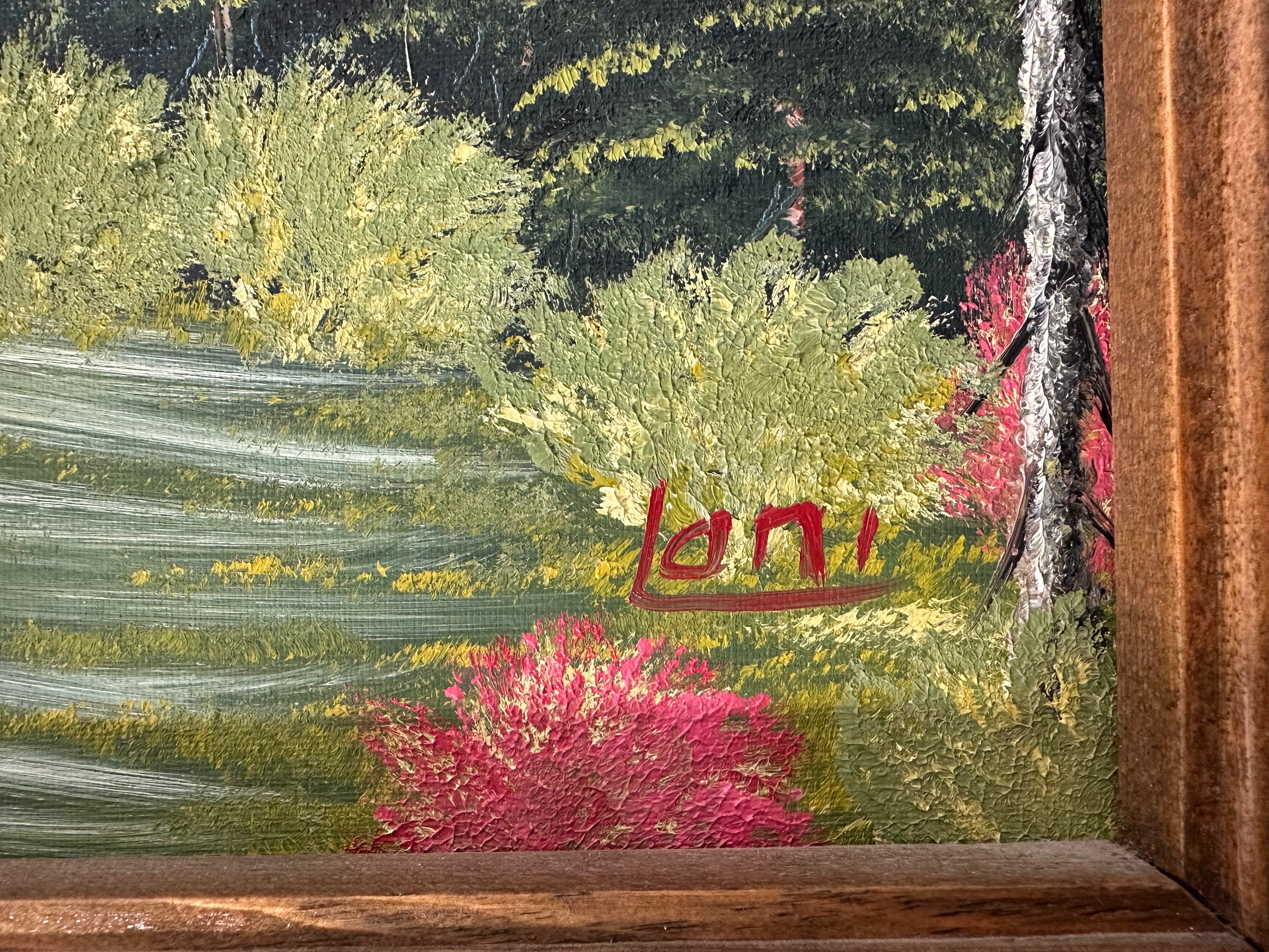 Close-up of a painting with a signature in red, surrounded by greenery and pink flowers.